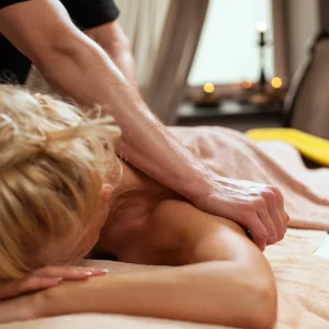 young-woman-enjoys-massage-spa